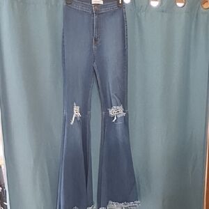 Vibrant Distressed Blue Flare Jeans
